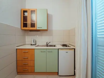 Kuhinja ili čajna kuhinja u objektu Apartments Pezo - Studio Apartment Tina 5