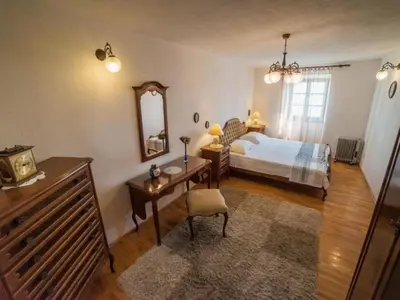 Krevet ili kreveti u jedinici u objektu Stone House Seaside Retreat on Bra Island - Two Bedroom Apartment 1