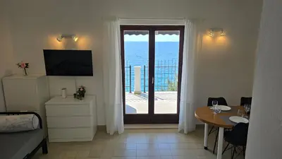 TV i/ili zabavni centar u objektu Beach House 5 stairs