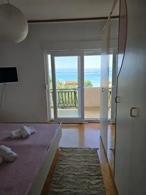 Krevet ili kreveti u jedinici u objektu Apartments Mila & Johnny
