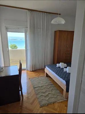 Krevet ili kreveti u jedinici u objektu Apartments Mila & Johnny