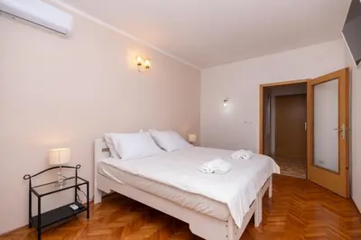 Krevet ili kreveti u jedinici u objektu Beachfront rooms Adriatic with breakfast