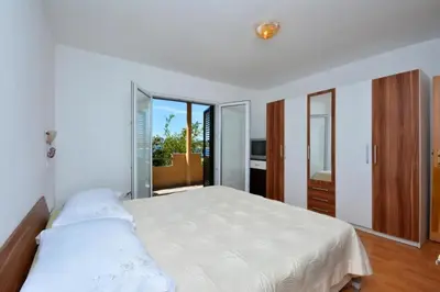 Krevet ili kreveti u jedinici u objektu Apartments by the sea Stobrec, Split - 24508