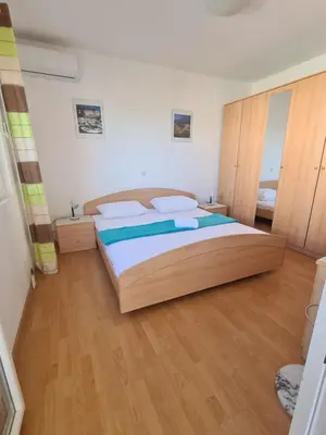 Krevet ili kreveti u jedinici u objektu Apartmani Barbarić