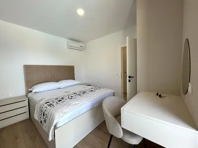 Krevet ili kreveti u jedinici u objektu Apartment Petar - private heated pool and sea view