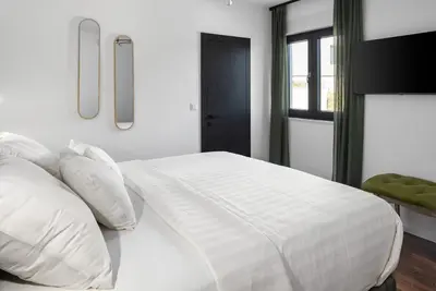 Krevet ili kreveti u jedinici u objektu Villa El Capitano Private Seaview Retreat Near Split