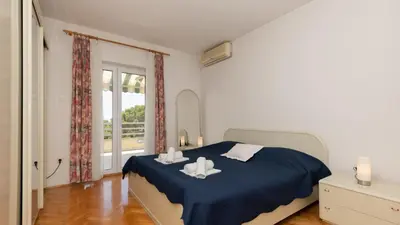 Krevet ili kreveti u jedinici u objektu Apartman KAM - Makarska by Villas Guide