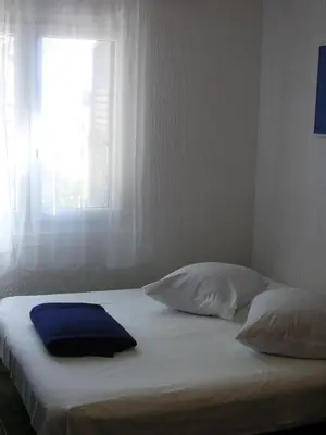 Krevet ili kreveti u jedinici u objektu Petar Apartment