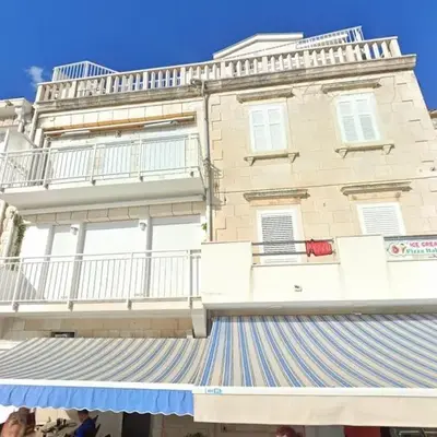 Apartments by the sea Povlja