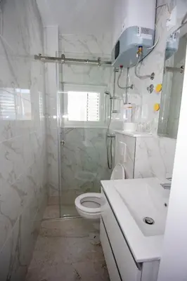 Kupaonica u objektu Apartments Miro - Front Row Sea View