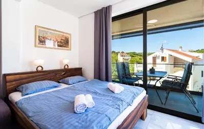 Krevet ili kreveti u jedinici u objektu 1 Bedroom Lovely Apartment In Sutivan