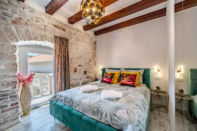 Krevet ili kreveti u jedinici u objektu Luxury Villa Unikat with Seaview & Jacuzzi