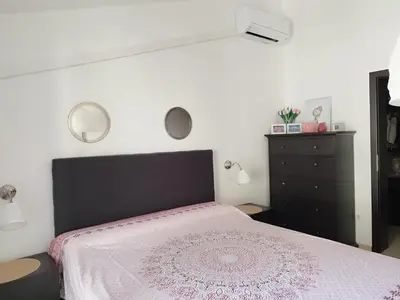 Krevet ili kreveti u jedinici u objektu Ferienwohnung am Sandstrand