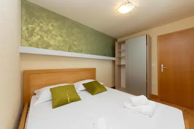 Krevet ili kreveti u jedinici u objektu Apartmani Brela 21