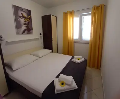 Krevet ili kreveti u jedinici u objektu Apartments Rogošić
