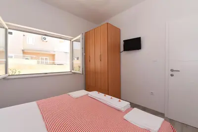 Krevet ili kreveti u jedinici u objektu Apartmani Makarska 22