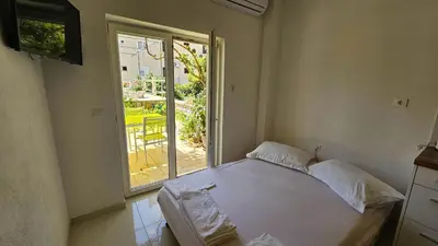 Krevet ili kreveti u jedinici u objektu Apartmani Makarska 22