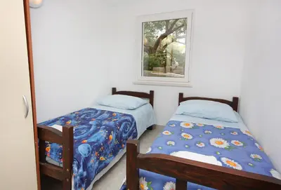 Krevet ili kreveti u jedinici u objektu Apartments by the sea Splitska, Brac - 5664