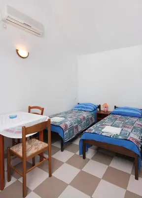 Krevet ili kreveti u jedinici u objektu Apartments by the sea Splitska, Brac - 5664
