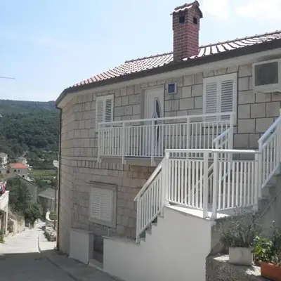 Apartments by the sea Povlja