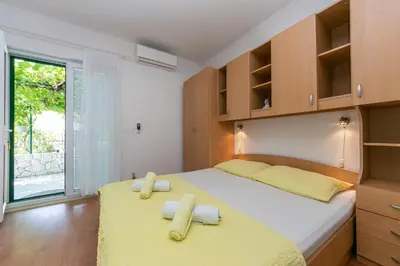 Krevet ili kreveti u jedinici u objektu Apartments with parking space Brela - Makarska - 6907