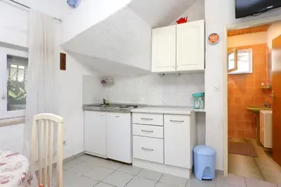 Kuhinja ili čajna kuhinja u objektu Apartments by the sea Orij, Omis - 7534