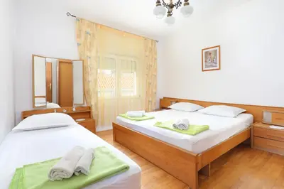 Krevet ili kreveti u jedinici u objektu Apartments by the sea Orij, Omis - 7534