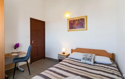Krevet ili kreveti u jedinici u objektu Beautiful Apartment In Omis With House Sea View