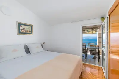 Krevet ili kreveti u jedinici u objektu Apartments by the sea Duce, Omis - 2737
