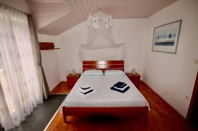 Krevet ili kreveti u jedinici u objektu Apartments by the sea Bol, Brac - 2904