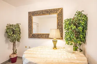 Krevet ili kreveti u jedinici u objektu A 8 apt w terrace & sea view 4 min walk to beach