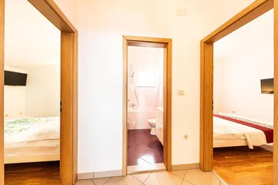 Krevet ili kreveti u jedinici u objektu A 6 apt w terrace & sea view 4 min walk to beach