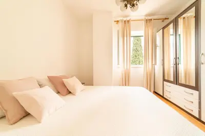 Krevet ili kreveti u jedinici u objektu Cosy apartments in Bol centre with loggia&seaview