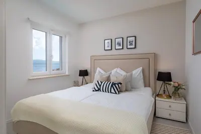 Krevet ili kreveti u jedinici u objektu Apartments Valentina