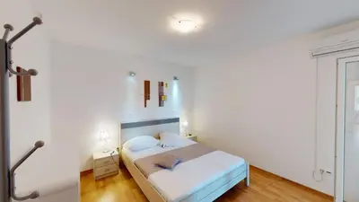 Krevet ili kreveti u jedinici u objektu Apartments Andrea - Beachfront & Sea-view Terrace