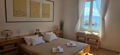 Krevet ili kreveti u jedinici u objektu Beach Side Holiday