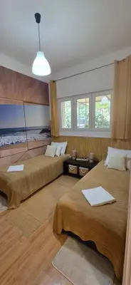 Krevet ili kreveti u jedinici u objektu Beach Side Holiday