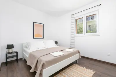 Krevet ili kreveti u jedinici u objektu Family friendly seaside apartments Duce, Omis - 24876