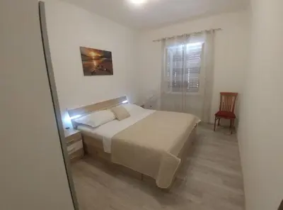 Krevet ili kreveti u jedinici u objektu Holiday Home Kokić