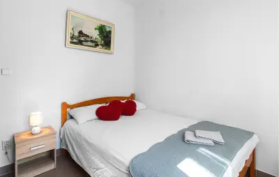 Krevet ili kreveti u jedinici u objektu Stunning Apartment In Omis With House Sea View