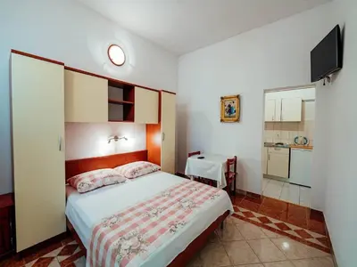 Krevet ili kreveti u jedinici u objektu Apartments Pezo - Studio apartment Tina 1