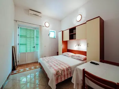 Krevet ili kreveti u jedinici u objektu Apartments Pezo - Studio apartment Tina 1