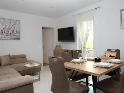 TV i/ili zabavni centar u objektu Dalmata D - Two Bedroom Apartment with Terrace