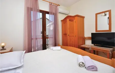 Krevet ili kreveti u jedinici u objektu Apartment Jelsa 07