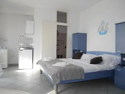 Krevet ili kreveti u jedinici u objektu Dugi Rat Seaside Apartments - Studio Apartment 2