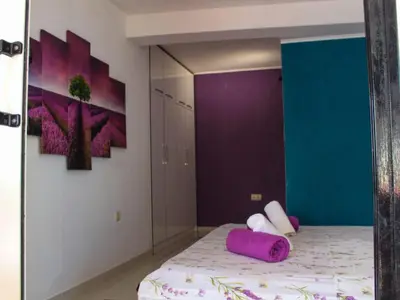 Krevet ili kreveti u jedinici u objektu Two Bedroom Apartment with Sea View and Private Pool