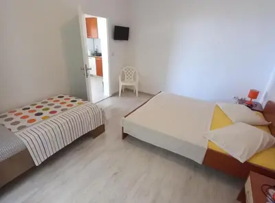 Krevet ili kreveti u jedinici u objektu Berti Sun & Sea Apartments