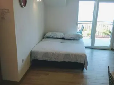 Krevet ili kreveti u jedinici u objektu Superior One Bedroom Apartment with Balcony and Sea View