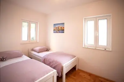 Krevet ili kreveti u jedinici u objektu Meerblick Apartment mit großer Sonnenterrasse für 6 Personen