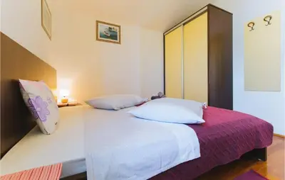 Krevet ili kreveti u jedinici u objektu 2 Bedroom Amazing Apartment In Omis